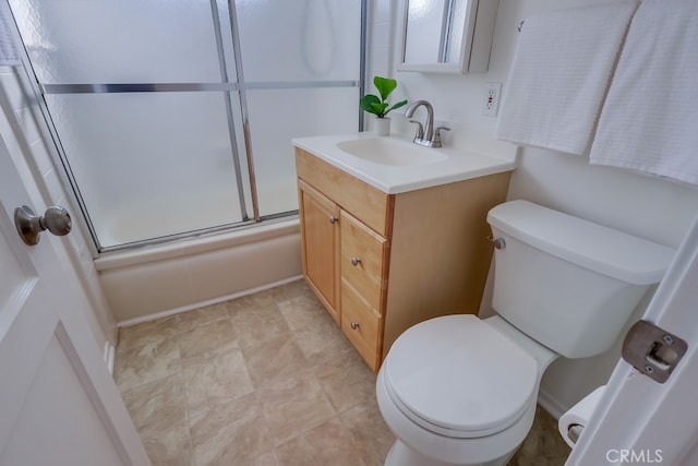 full bath featuring toilet, combined bath / shower with glass door, and vanity