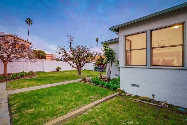 view of yard featuring fence