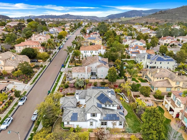 bird's eye view with a residential view and a mountain view