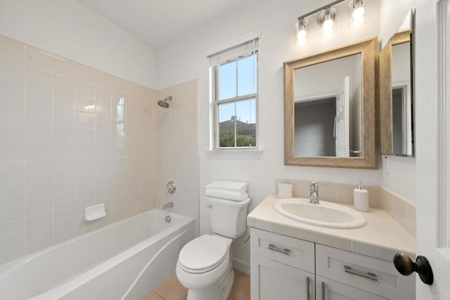 bathroom with shower / bathtub combination, vanity, and toilet