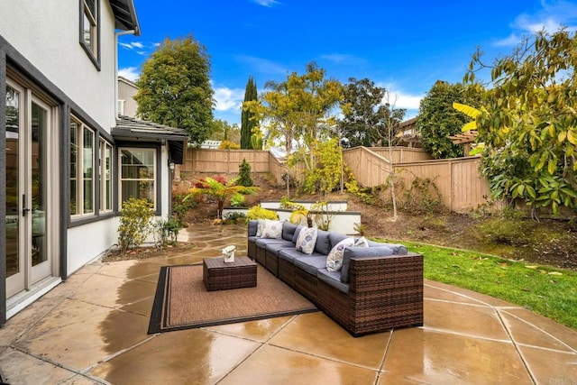 view of patio / terrace with a fenced backyard and an outdoor hangout area