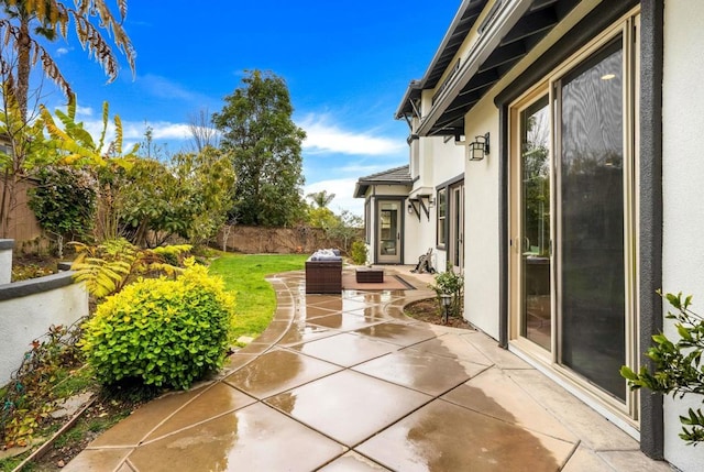 view of patio with fence