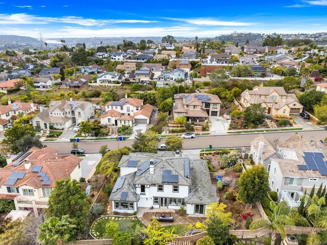 birds eye view of property with a residential view