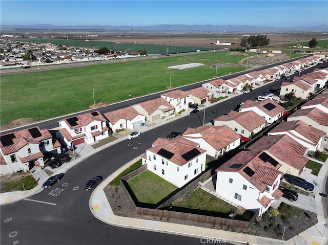 aerial view featuring a residential view and a mountain view