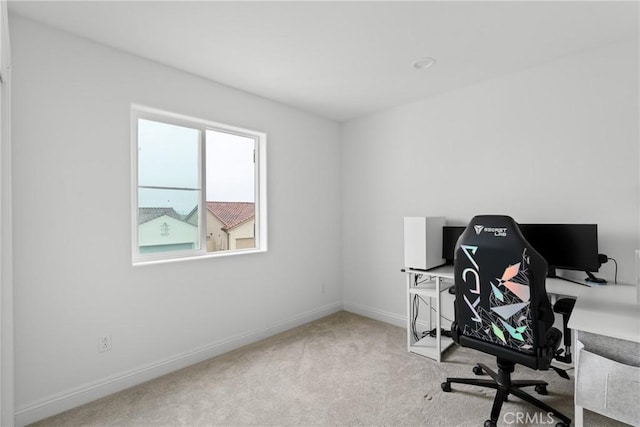 home office featuring carpet floors and baseboards