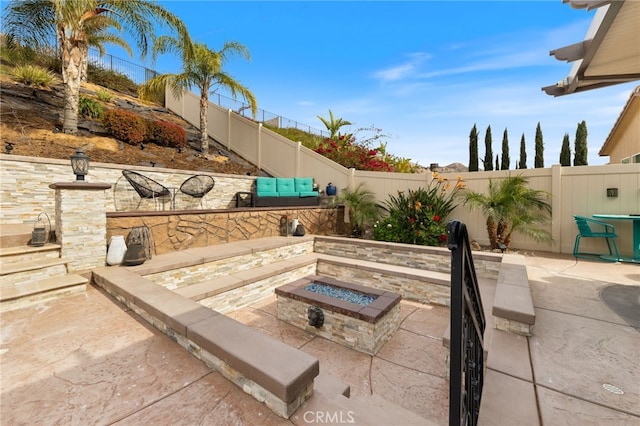 20900 Center St, Riverside, CA 92507 - fenced backyard featuring an outdoor fire pit and a patio