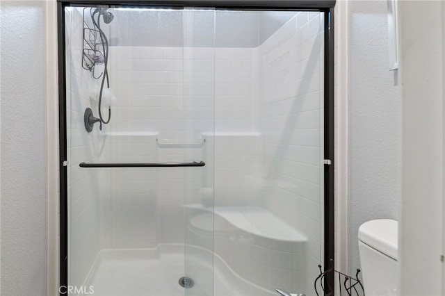 20900 Center St, Riverside, CA 92507 - full bath with a stall shower and a textured wall