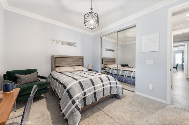 20900 Center St, Riverside, CA 92507 - bedroom with ornamental molding, a closet, and carpet flooring