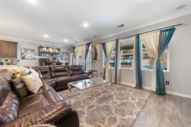 20900 Center St, Riverside, CA 92507 - living room featuring ornamental molding, light wood finished floors, and recessed lighting