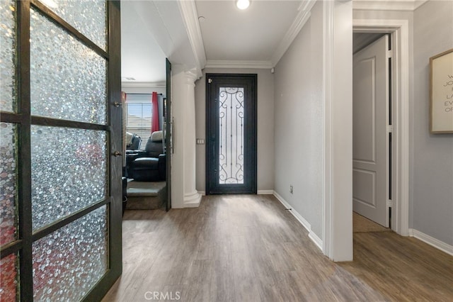 20900 Center St, Riverside, CA 92507 - entrance foyer with decorative columns, wood finished floors, and crown molding