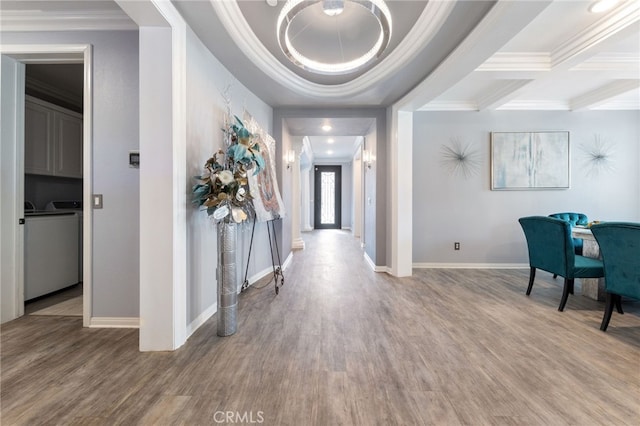 20900 Center St, Riverside, CA 92507 - entrance foyer featuring washer / dryer, crown molding, wood finished floors, and a chandelier