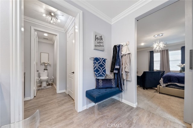 20900 Center St, Riverside, CA 92507 - corridor with a chandelier, wood finished floors, and ornamental molding