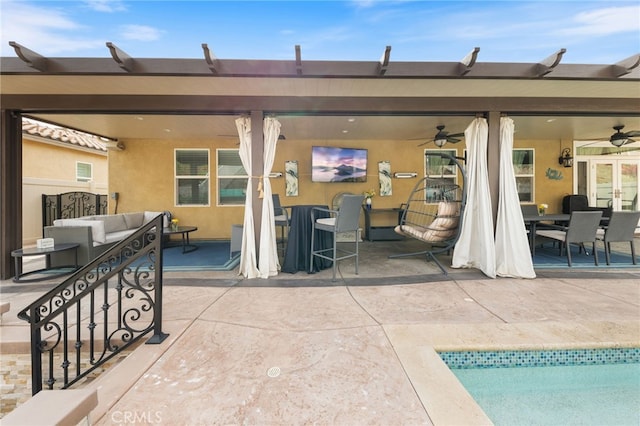 20900 Center St, Riverside, CA 92507 - view of patio / terrace with a ceiling fan, outdoor lounge area, an outdoor pool, and outdoor dining space