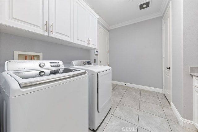20900 Center St, Riverside, CA 92507 - laundry area featuring cabinet space, ornamental molding, washer and dryer, and light tile patterned flooring