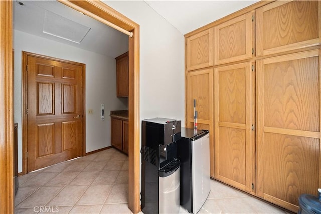 hallway with light tile patterned floors