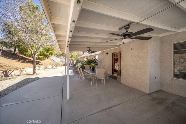 view of patio / terrace featuring ceiling fan and outdoor dining space