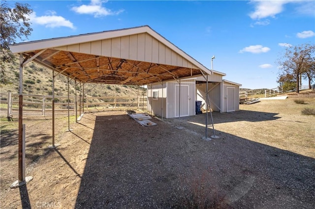 exterior space with an outbuilding and an exterior structure