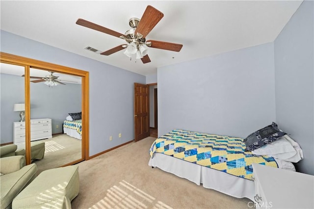 bedroom with baseboards, ceiling fan, visible vents, and carpet flooring