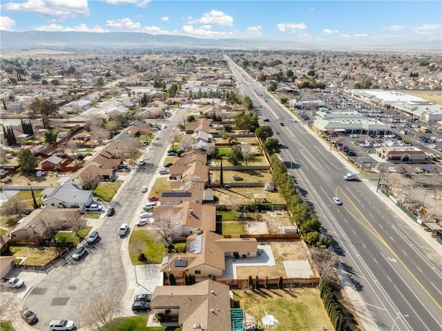 aerial view featuring a residential view and a mountain view