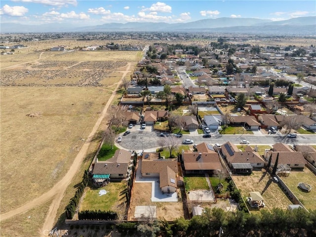 bird's eye view with a residential view and a mountain view