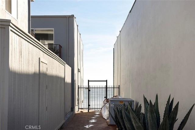 view of side of home with fence