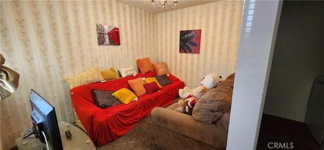 carpeted living room with wallpapered walls