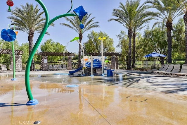 view of play area featuring fence