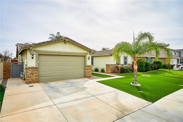 view of front of house with stucco siding, an attached garage, stone siding, driveway, and a front lawn