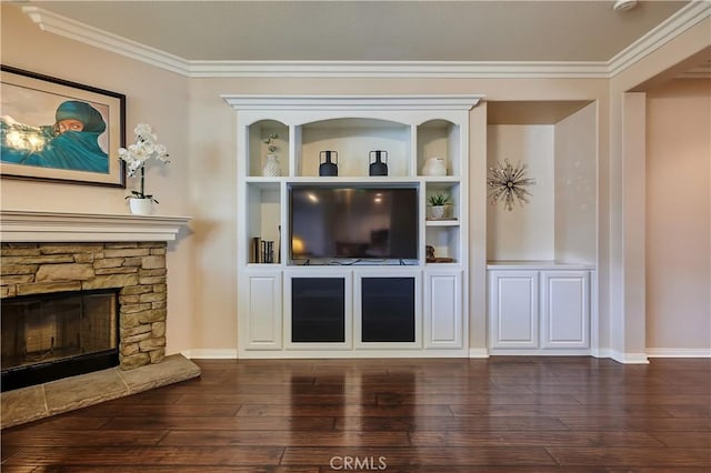 unfurnished living room with a fireplace, crown molding, baseboards, and wood finished floors