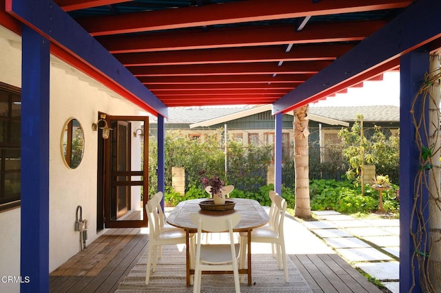 view of patio / terrace with outdoor dining area and a deck