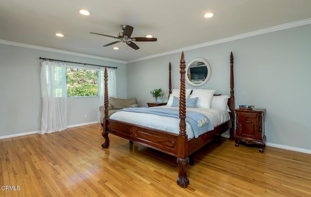 bedroom featuring baseboards, ornamental molding, and light wood-style floors