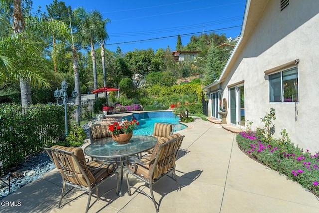 view of patio featuring an outdoor pool