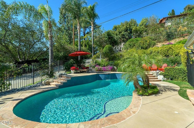 view of pool with a patio, fence, and a fenced in pool