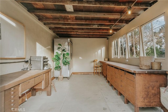 basement featuring wooden ceiling