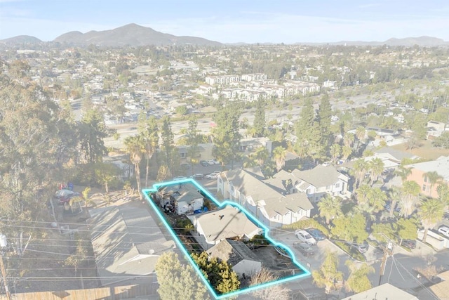 bird's eye view featuring a residential view and a mountain view