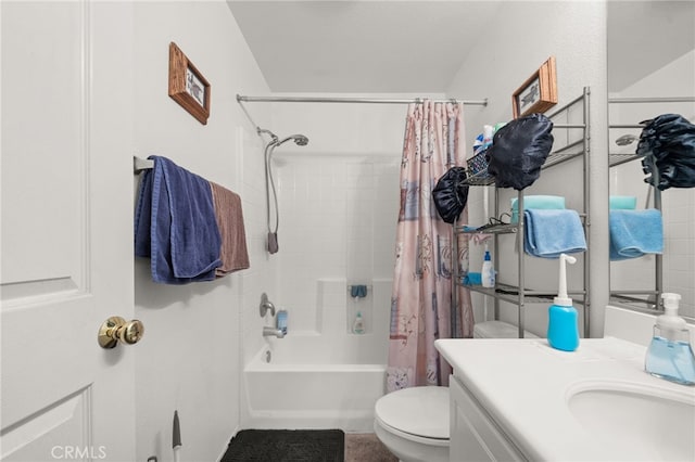 full bathroom featuring toilet, shower / bathtub combination with curtain, and vanity