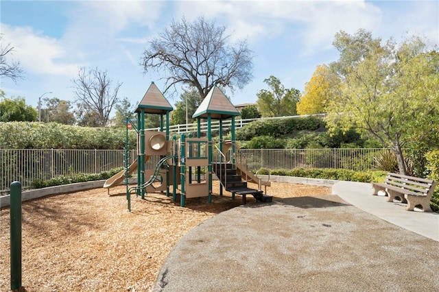 community play area featuring fence