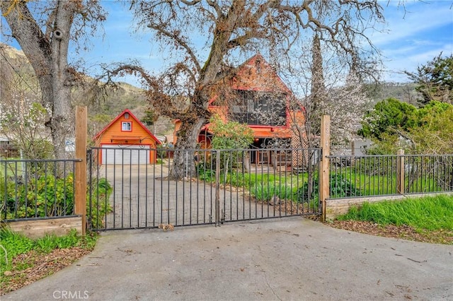 view of gate featuring fence