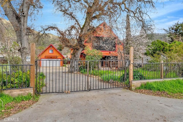 6874 Frontage Rd, Lucerne, CA 95458 - view of gate with a mountain view and fence