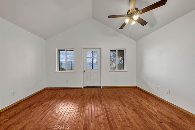 6874 Frontage Rd, Lucerne, CA 95458 - empty room with light wood finished floors, baseboards, a ceiling fan, and vaulted ceiling