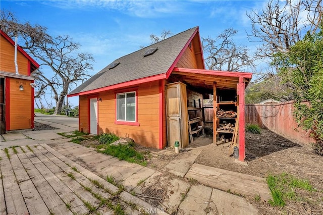 6874 Frontage Rd, Lucerne, CA 95458 - view of outbuilding featuring fence and an outbuilding