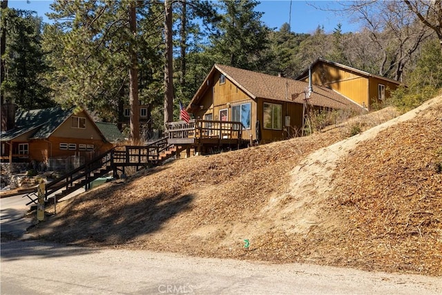 exterior space with a wooden deck