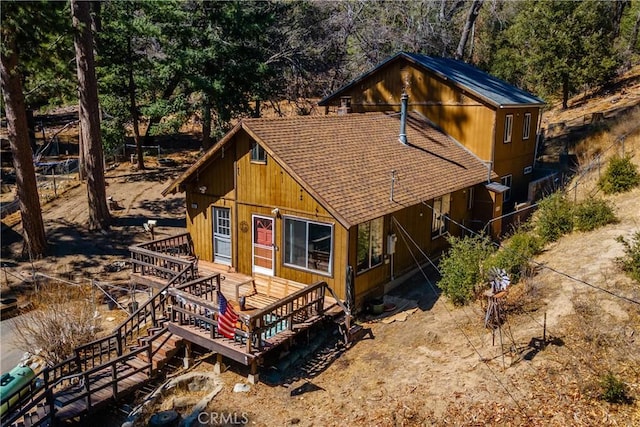 view of front of home with roof with shingles