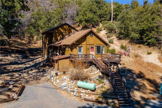 chalet / cabin featuring stairway