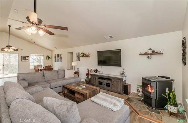 47384 Veater Ranch Rd, Coarsegold, CA 93614 - living room featuring wood finished floors, a wood stove, ceiling fan, lofted ceiling, and baseboards