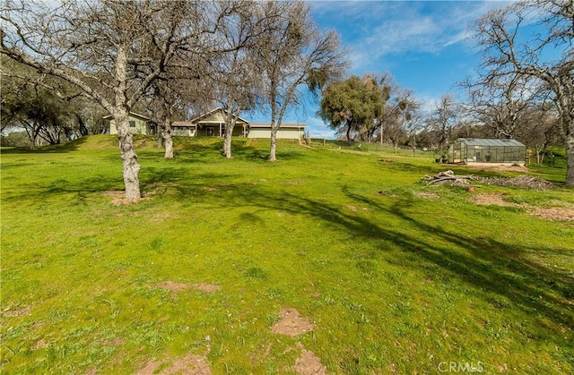 47384 Veater Ranch Rd, Coarsegold, CA 93614 - view of grassy yard featuring an exterior structure and an outbuilding