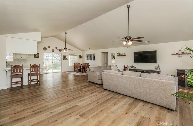 47384 Veater Ranch Rd, Coarsegold, CA 93614 - living area with a ceiling fan, light wood finished floors, and high vaulted ceiling
