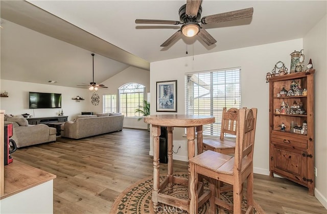 47384 Veater Ranch Rd, Coarsegold, CA 93614 - dining room featuring ceiling fan, lofted ceiling, light wood finished floors, and baseboards