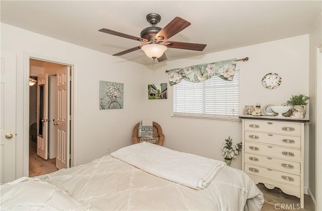 47384 Veater Ranch Rd, Coarsegold, CA 93614 - bedroom featuring wood finished floors and a ceiling fan