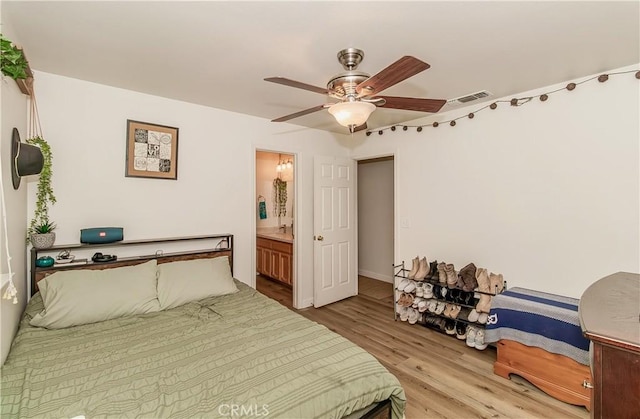 47384 Veater Ranch Rd, Coarsegold, CA 93614 - bedroom featuring wood finished floors, a ceiling fan, baseboards, and ensuite bathroom